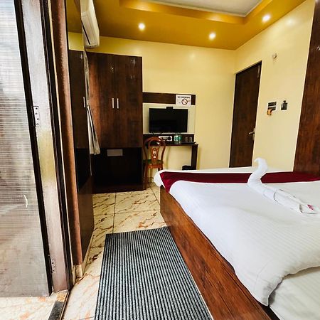 Hotel Kanan Inn Колката Екстериор снимка